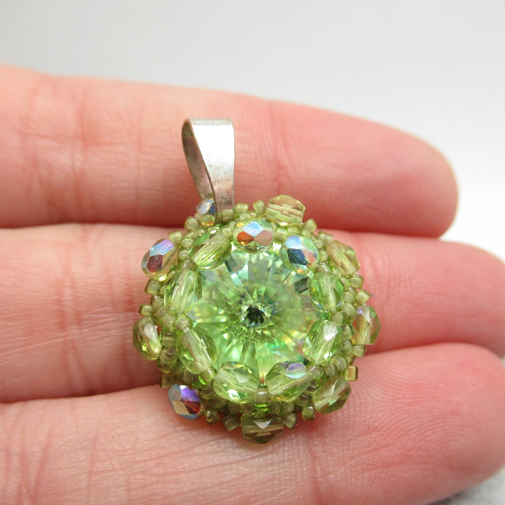 Hand Woven Rivoli Pendant 20$